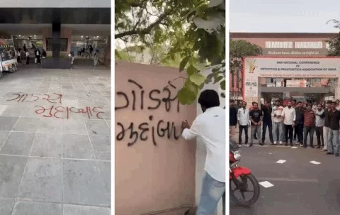 અમદાવાદમાં 'ગોડસે' નાટક સામે સંગ્રામ: NSUIએ ટાઉન હોલની દીવાલો પર સૂત્રો લખી નોંધાવ્યો ઉગ્ર વિરોધ!