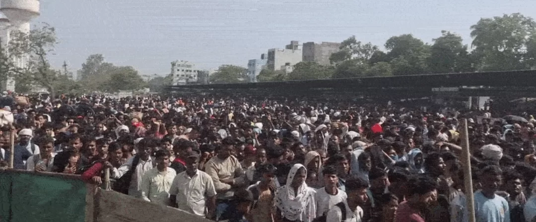 ઉધના રેલવે સ્ટેશન પર વેકેશનમાં વતન વાળાઓની ભીડ મુસાફરોનો તોફાન: 3 કિમી લાઈનો, પાણી માટે ધક્કામુક્કી અને પોલીસ લાઠીચાર્જ